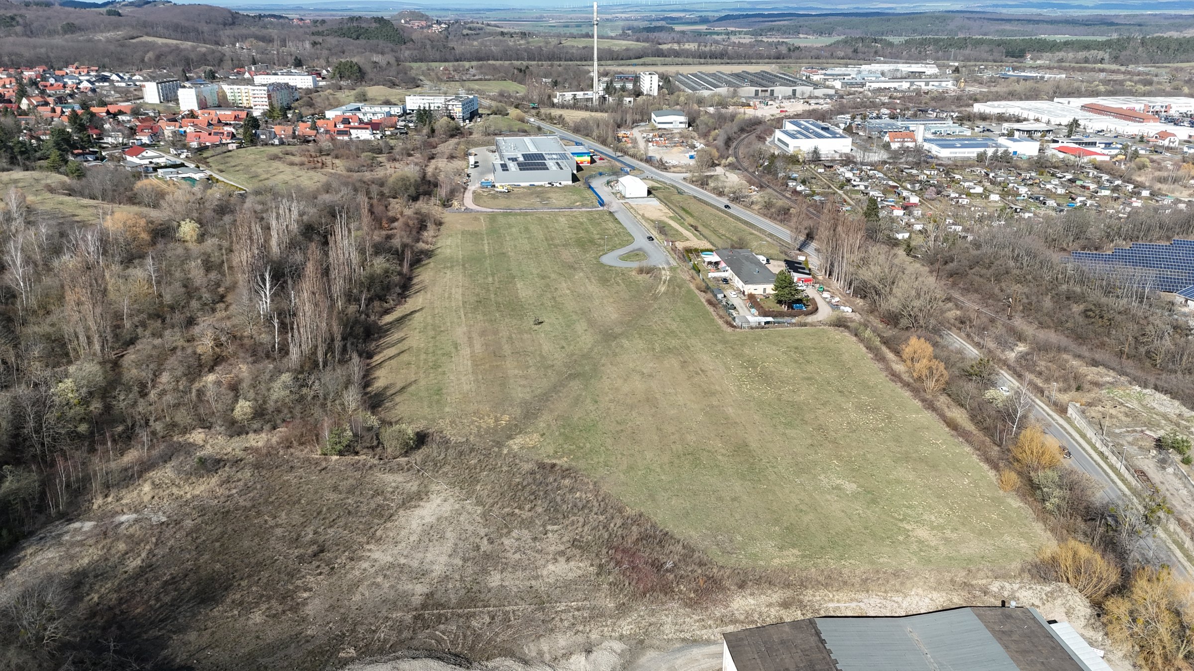 The Blankenburg site from the air, the cleared platform against the town