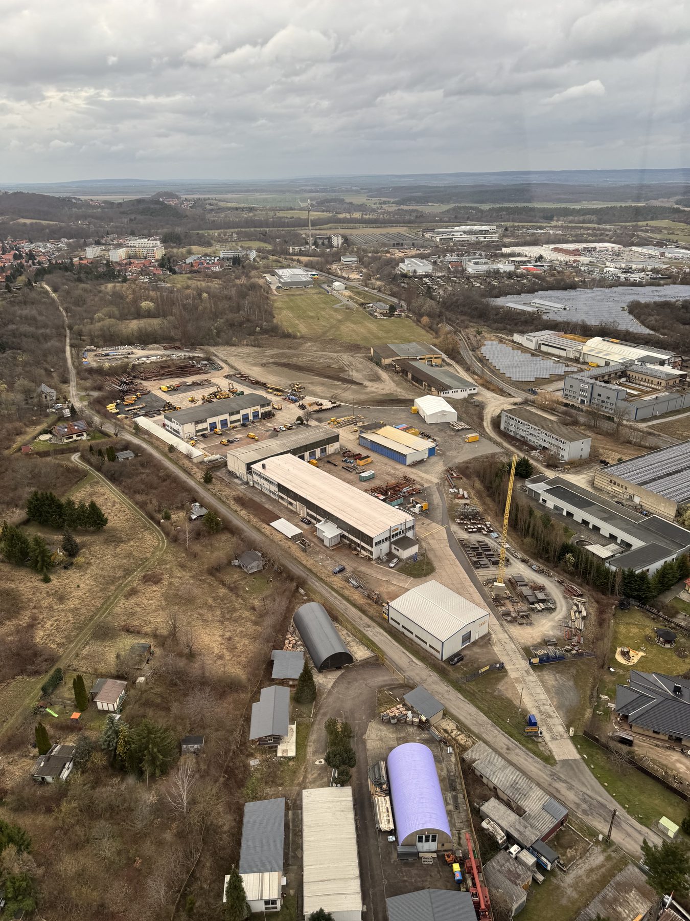 Aerial view over the industrial area at Blankenburg, the campus land beyond it